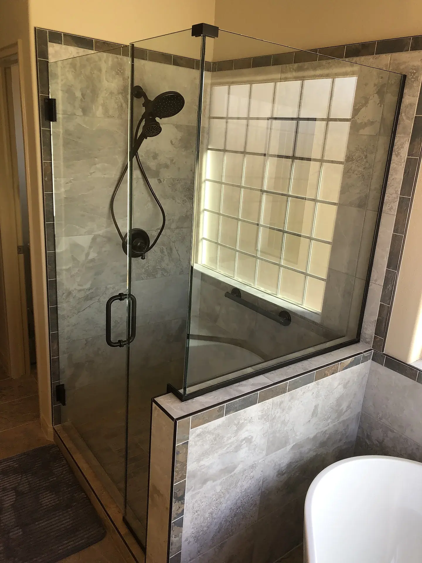 Bathroom remodel project — before and after, by One Stop Construction in Southern Utah